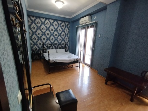 Imagen de la habitación del Hotel Hotel White Magnolia. Foto 18