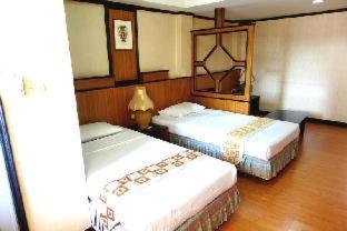 Imagen de la habitación del Hotel Hotel Win Long. Foto 6