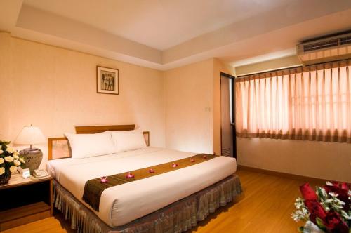 Imagen de la habitación del Hotel Hotel Win Long. Foto 10