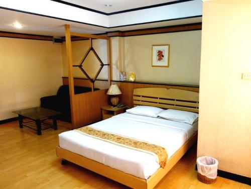 Imagen de la habitación del Hotel Hotel Win Long. Foto 11