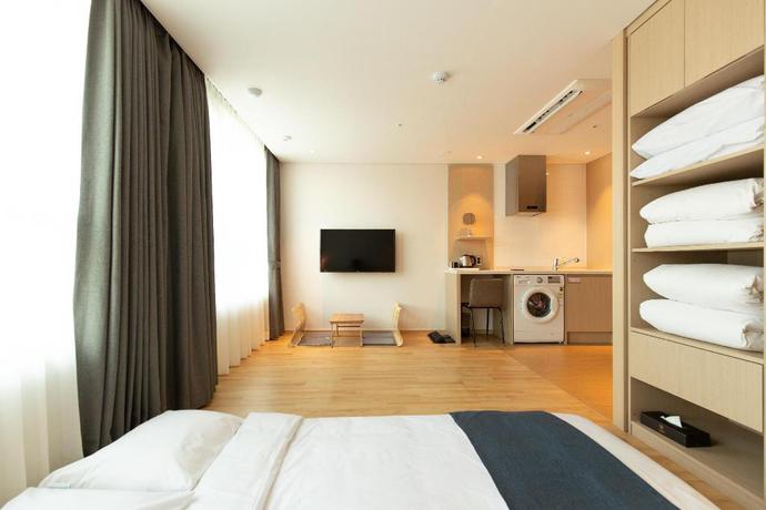Imagen de la habitación del Hotel Hotel Win Story. Foto 8