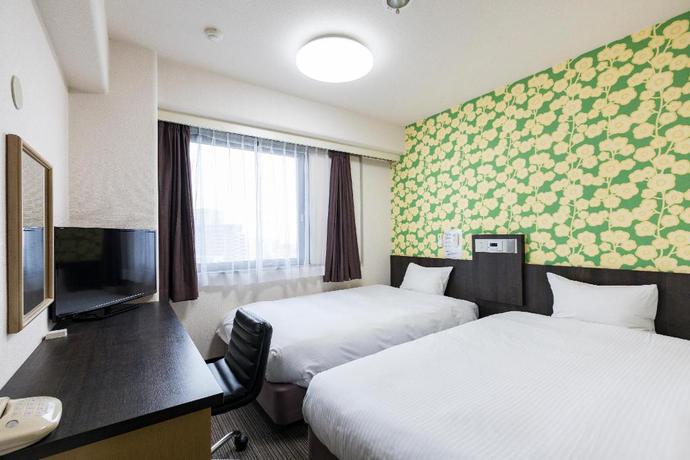 Imagen de la habitación del Hotel Hotel Wing International Kumamoto-Yatsushiro. Foto 19