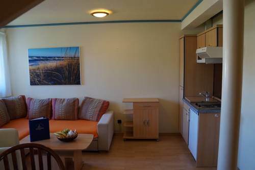 Imagen de la habitación del Hotel Hotel- & Ferienanlage Kapit&auml;ns-h&auml;user Breege. Foto 3