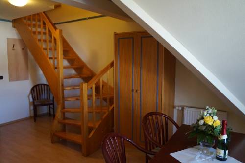 Imagen de la habitación del Hotel Hotel- & Ferienanlage Kapit&auml;ns-h&auml;user Breege. Foto 4