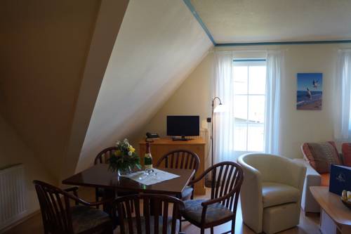 Imagen de la habitación del Hotel Hotel- & Ferienanlage Kapit&auml;ns-h&auml;user Breege. Foto 5