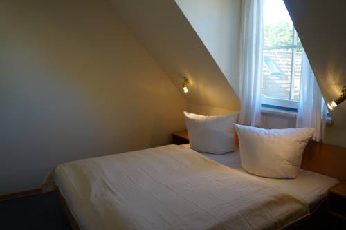 Imagen de la habitación del Hotel Hotel- & Ferienanlage Kapit&auml;ns-h&auml;user Breege. Foto 6