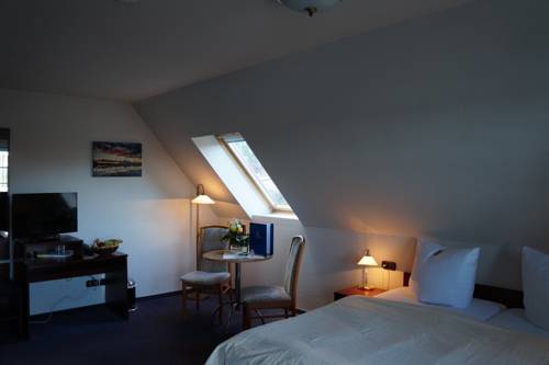 Imagen de la habitación del Hotel Hotel- & Ferienanlage Kapit&auml;ns-h&auml;user Breege. Foto 8