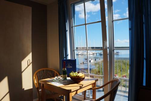 Imagen de la habitación del Hotel Hotel- & Ferienanlage Kapit&auml;ns-h&auml;user Breege. Foto 9