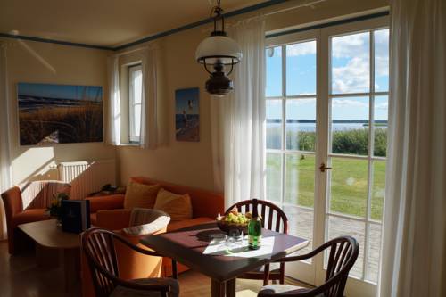 Imagen de la habitación del Hotel Hotel- & Ferienanlage Kapit&auml;ns-h&auml;user Breege. Foto 11