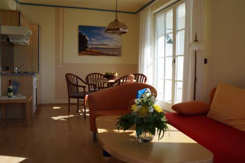 Imagen de la habitación del Hotel Hotel- & Ferienanlage Kapit&auml;ns-h&auml;user Breege. Foto 14