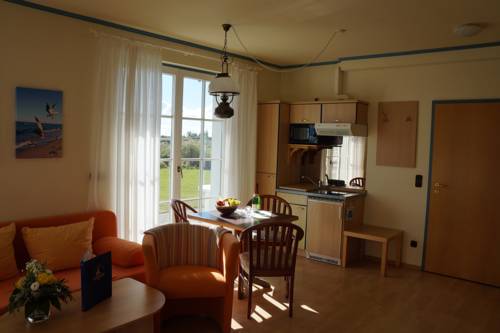 Imagen de la habitación del Hotel Hotel- & Ferienanlage Kapit&auml;ns-h&auml;user Breege. Foto 15