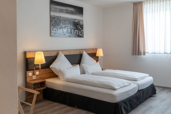Imagen de la habitación del Hotel Hotel in Laisen. Foto 12