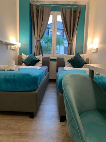 Imagen de la habitación del Hotel Hotel underSTAYtement. Foto 2