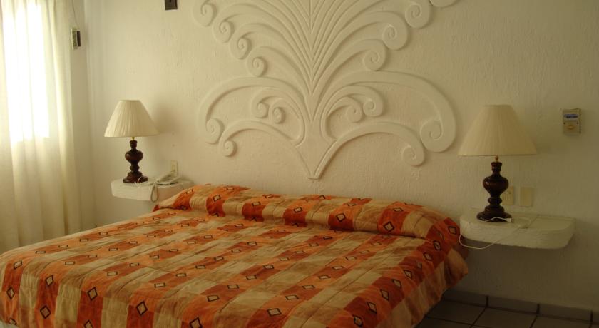 Imagen de la habitación del Hotel Hotel y Suites Santa Cecilia. Foto 2