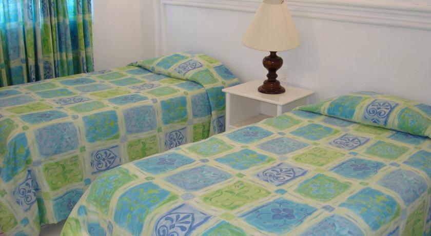 Imagen de la habitación del Hotel Hotel y Suites Santa Cecilia. Foto 3