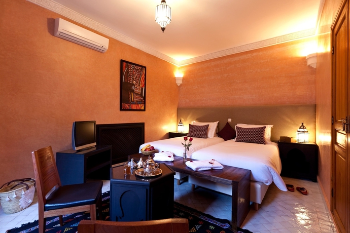 Imagen de la habitación del Hotel Hotel y spa Riad El Walaa. Foto 9