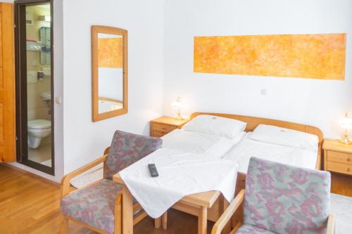 Imagen de la habitación del Hotel Hotel-Garni & Hostel Sandwirt. Foto 16