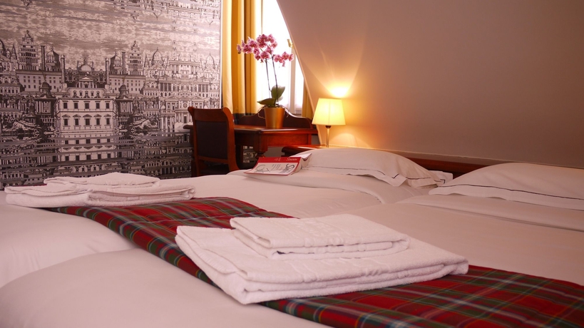 Imagen de la habitación del Hotel HotelHome Paris 16. Foto 2