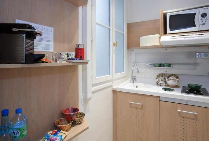 Imagen de la habitación del Hotel HotelHome Paris 16. Foto 4