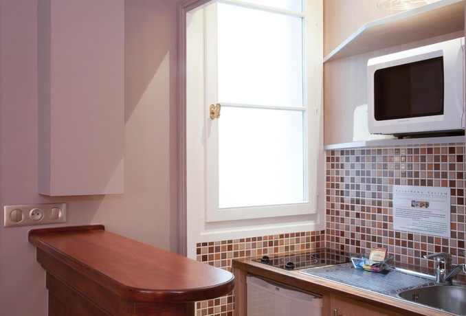 Imagen de la habitación del Hotel HotelHome Paris 16. Foto 6