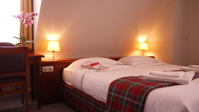 Imagen de la habitación del Hotel HotelHome Paris 16. Foto 10