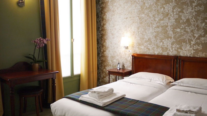 Imagen de la habitación del Hotel HotelHome Paris 16. Foto 12