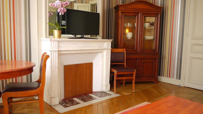 Imagen de la habitación del Hotel HotelHome Paris 16. Foto 16