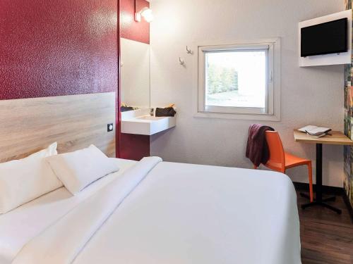Imagen de la habitación del Hotel Hotelf1 Annemasse. Foto 16