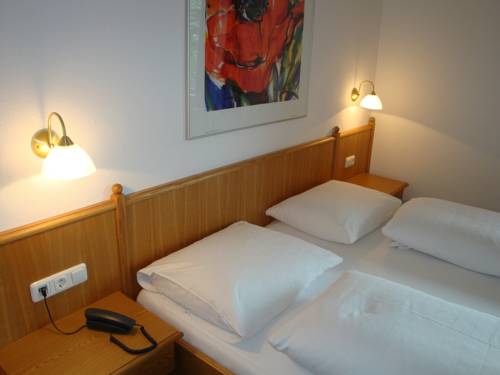 Imagen de la habitación del Hotel Hotel-garni Austria. Foto 10