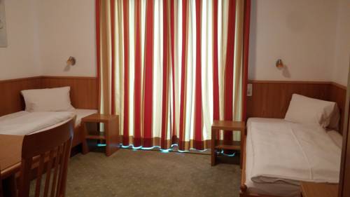 Imagen de la habitación del Hotel Hotel-garni Austria. Foto 15