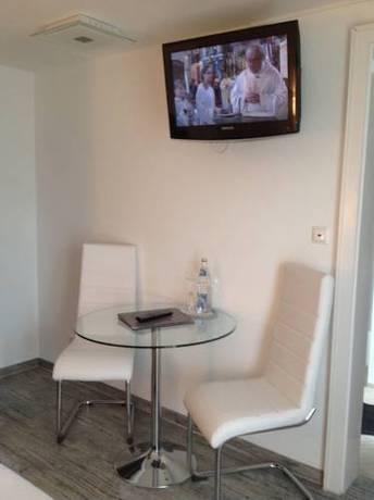 Imagen de la habitación del Hotel Hotel-garni Fels. Foto 16