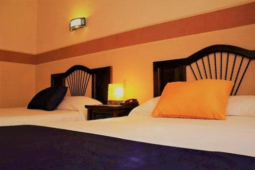 Imagen de la habitación del Hotel Hoteli Alifer Tlaxcala X TECAL LIVING. Foto 16