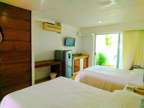 Imagen de la habitación del Hotel Hotelito Escondido. Foto 7