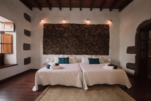 Imagen de la habitación del Hotel Hotelito Rural Flor de Timanfaya. Foto 13