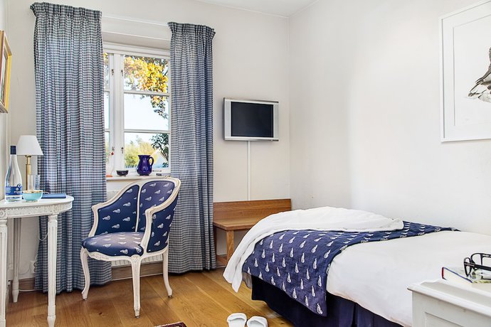Imagen de la habitación del Hotel Hotell G&auml;sslingen. Foto 12