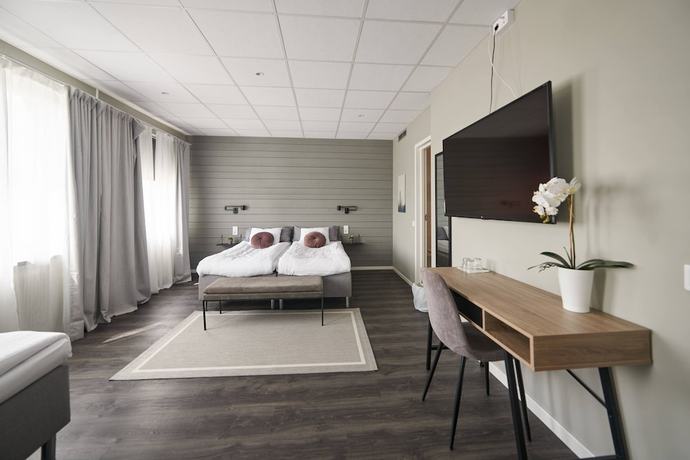 Imagen de la habitación del Hotel Hotell R&aring;dhuset. Foto 7