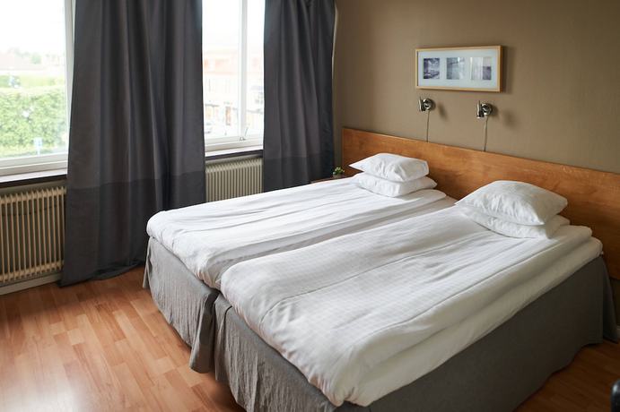Imagen de la habitación del Hotel Hotell R&aring;dhuset. Foto 9