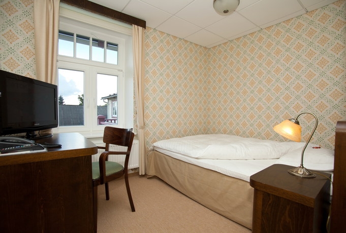 Imagen de la habitación del Hotel Hotell R&auml;pina. Foto 4