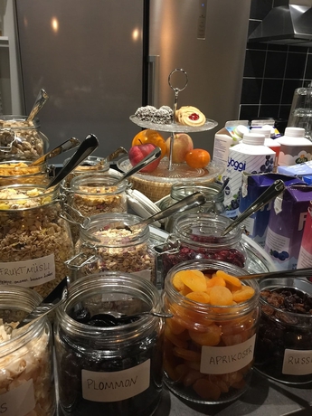 Imagen del bar/restaurante del Hotel Hotell Stortorget, &ouml;stersund. Foto 7