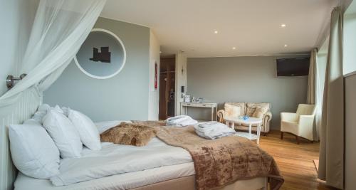 Imagen de la habitación del Hotel Hotell och Restaurang Hovs Hallar. Foto 8