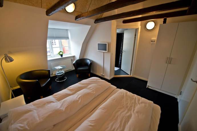 Imagen de la habitación del Hotel Hotellet. Foto 15