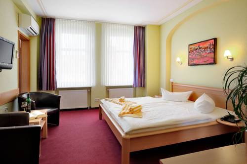 Imagen de la habitación del Hotel Hotel-pension Am Schwanenteich. Foto 10