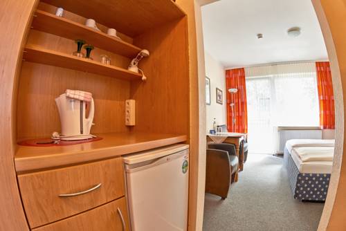 Imagen de la habitación del Hotel Hotel-pension Elfi. Foto 11