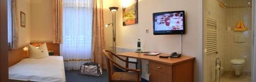 Imagen de la habitación del Hotel Hotel-pension Vier Jahreszeiten. Foto 9