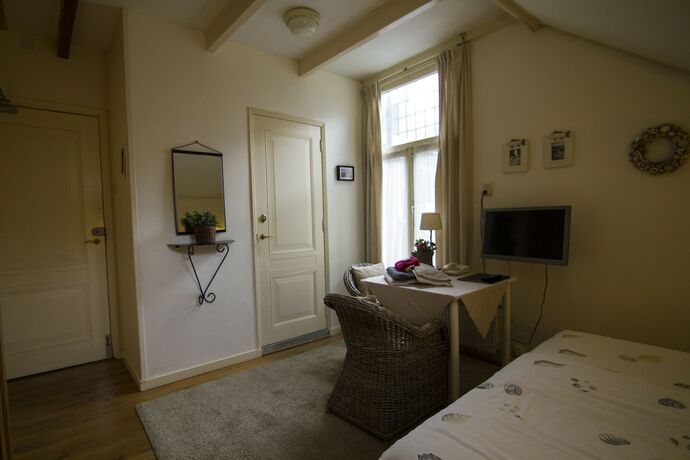 Imagen de la habitación del Hotel Hotel-pension Zoom-oord. Foto 14