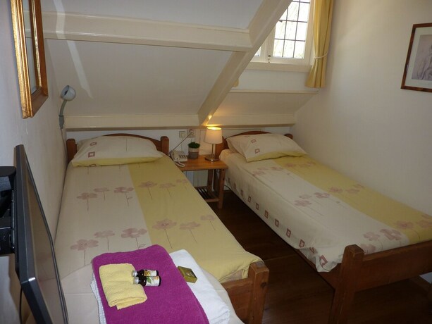 Imagen de la habitación del Hotel Hotel-pension Zoom-oord. Foto 16