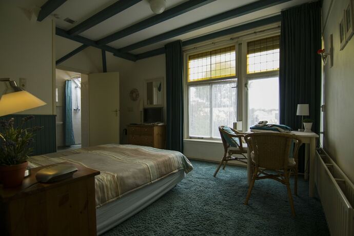 Imagen de la habitación del Hotel Hotel-pension Zoom-oord. Foto 18