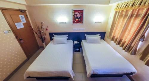 Imagen de la habitación del Hotel Hou Kong. Foto 3