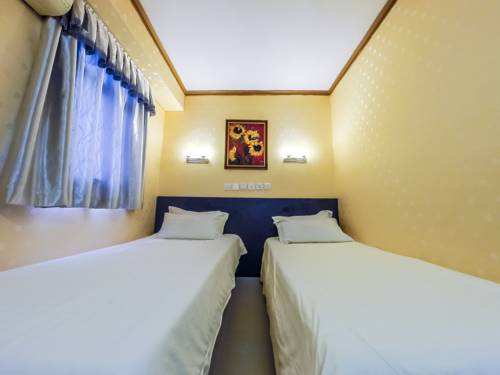 Imagen de la habitación del Hotel Hou Kong. Foto 4