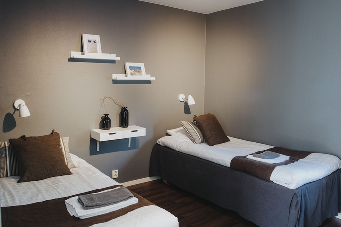 Imagen de la habitación del Hotel H&ouml;llviksn&auml;s m&ouml;ten mat logi. Foto 4